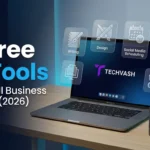 TechVash desk setup featuring an open laptop, glassmorphism AI tool icons, and text reading 7 Free AI Tools For Small Business Owners (2026).
